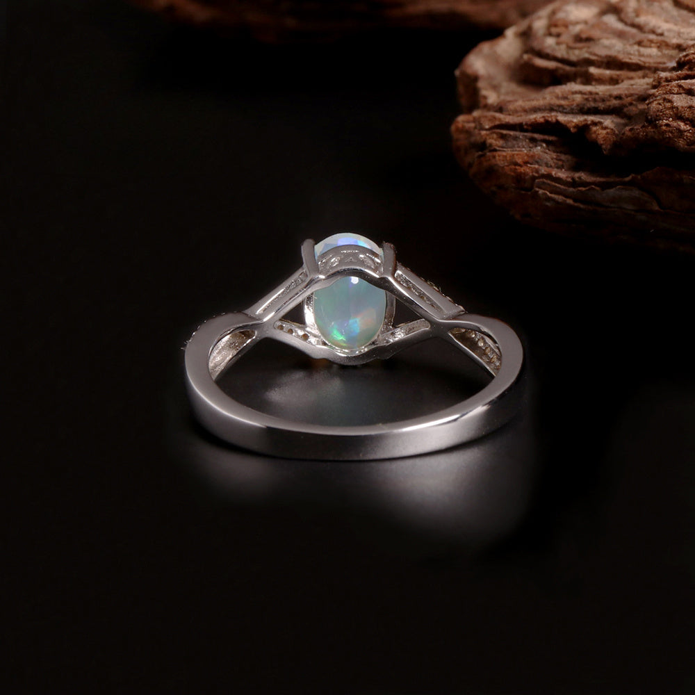 ‘Blythe’ Oval Opal Crossover Solitaire Ring – front upright