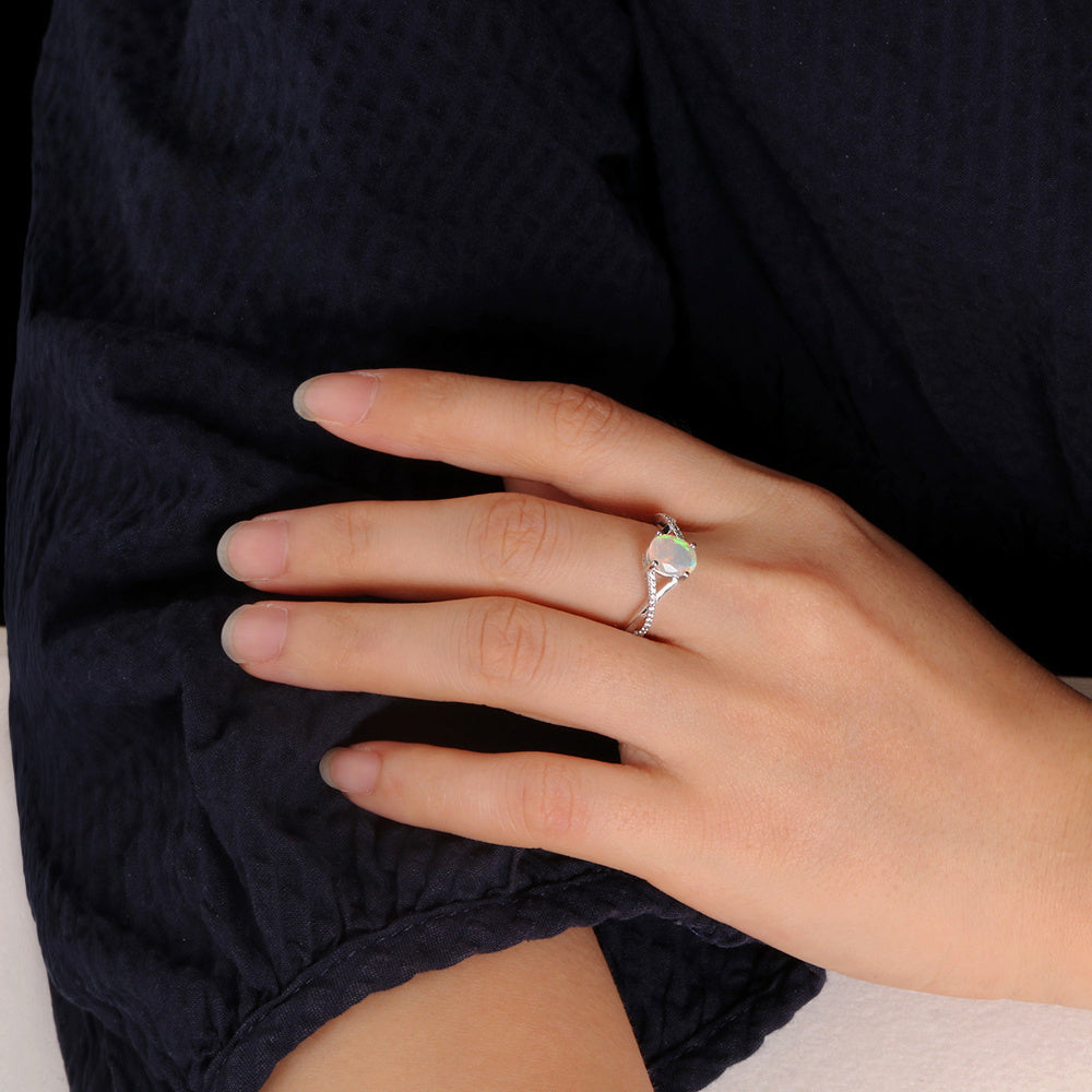 ‘Blythe’ Oval Opal Crossover Solitaire Ring – on hand