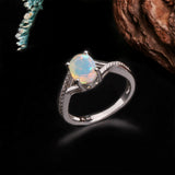 ‘Blythe’ Oval Opal Crossover Solitaire Ring – side view