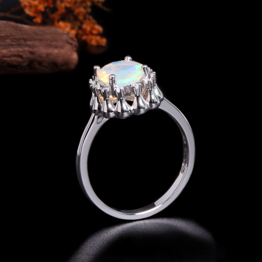 ‘Honora’ Oval Opal Crown Halo Ring – upright view