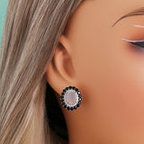 ‘Edith’ Oval Opal Double Halo Earrings (7 × 9 mm) – on ear