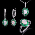 ‘Sylvie’ Oval Opal Emerald Halo Set