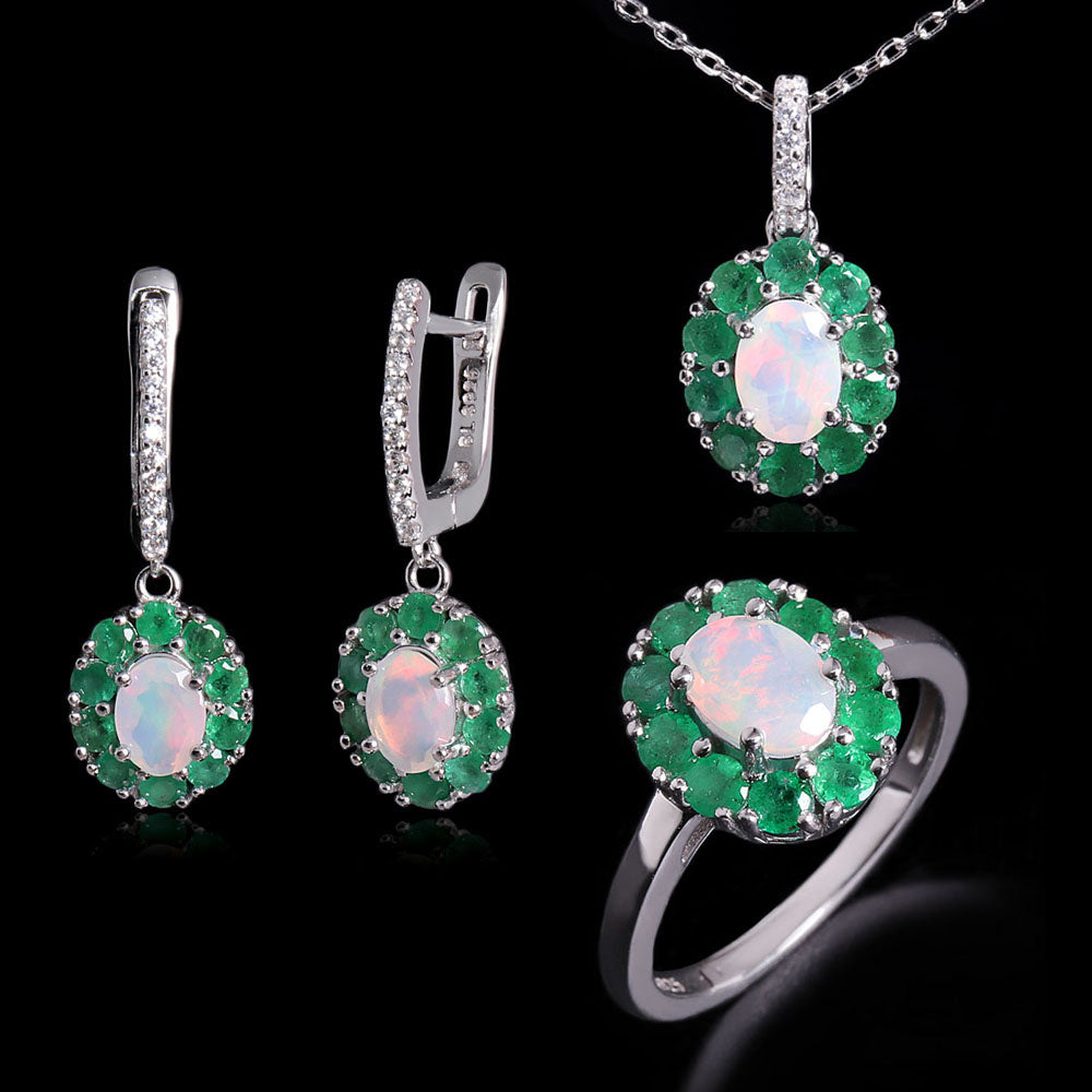 ‘Sylvie’ Oval Opal Emerald Halo Set