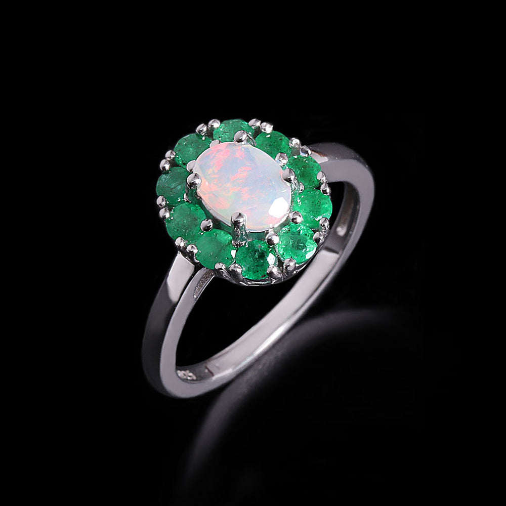 ‘Sylvie’ Oval Opal Emerald Halo Set – ring front