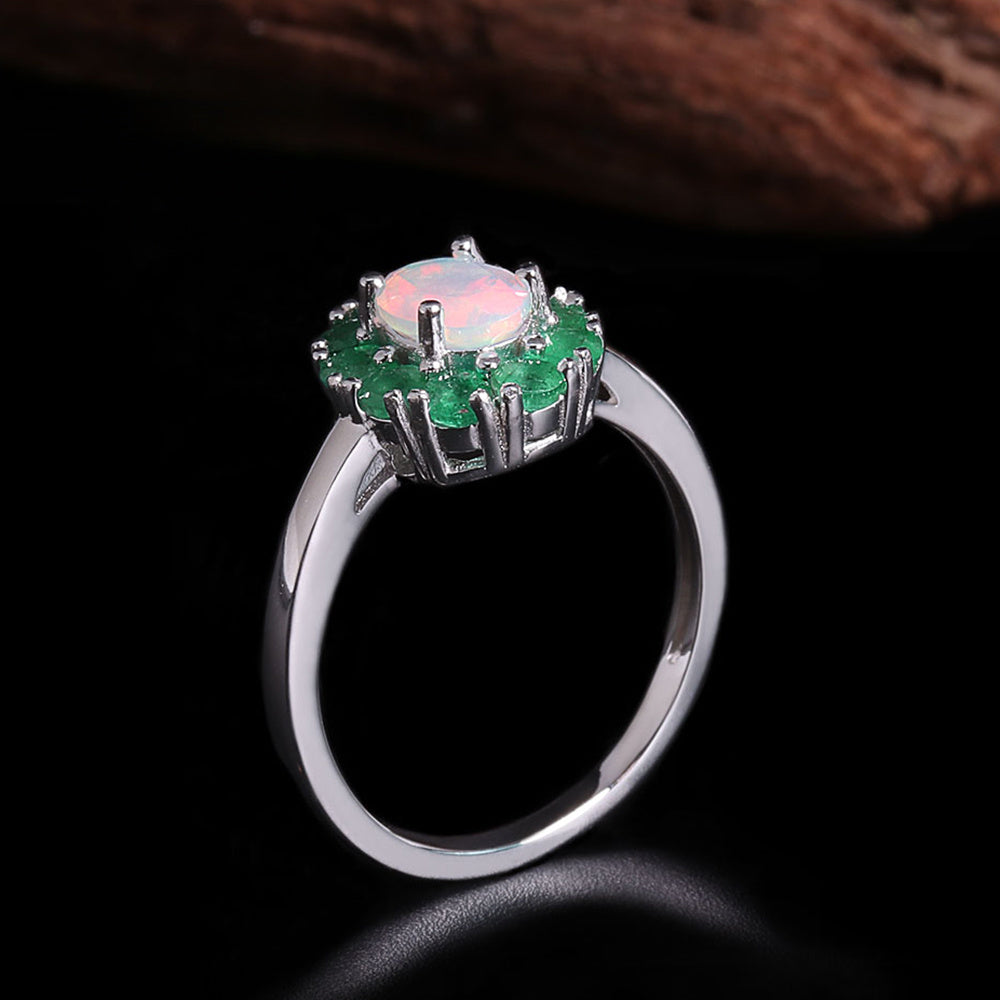 ‘Sylvie’ Oval Opal Emerald Halo Set – ring side view