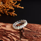 ‘Everly’ Oval Opal Eternity Band Ring – on wood