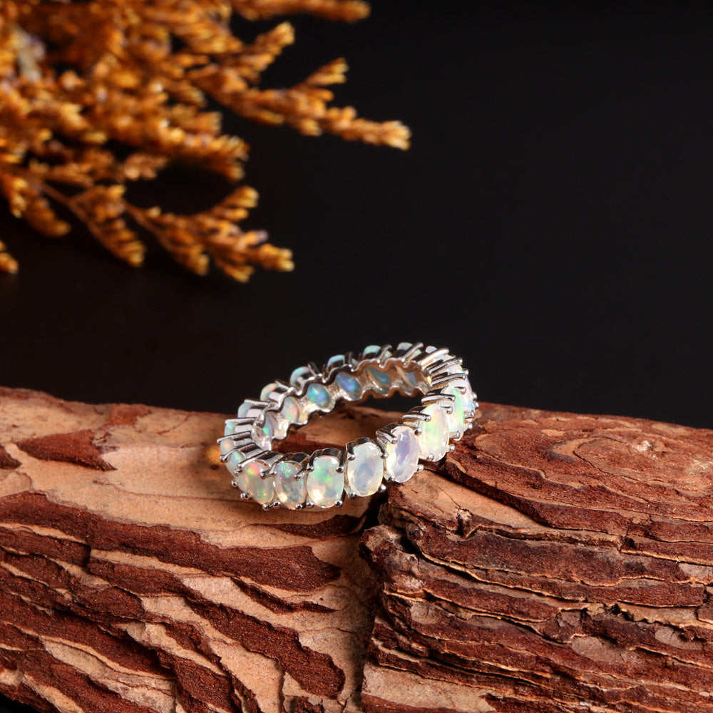 ‘Everly’ Oval Opal Eternity Band Ring – on wood