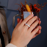 ‘Everly’ Oval Opal Eternity Band Ring – on hand vase