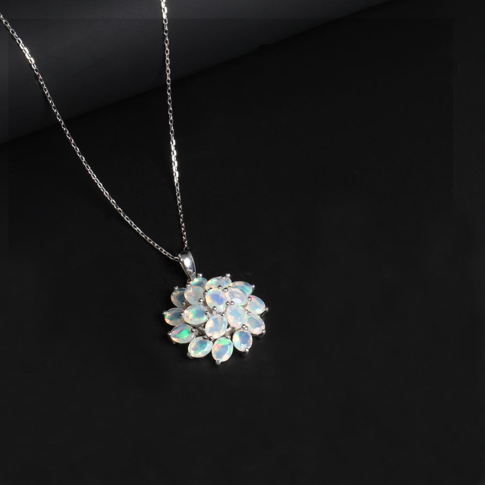 ‘Bluebell’ Oval Opal Flower Cluster Pendant – on black