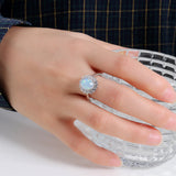 ‘Lavender’ Oval Opal Flower Halo Ring – on hand