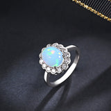 ‘Elsie’ Oval Opal Flower Halo Set – ring