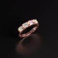 ‘Peony’ Oval Opal Half Eternity Ring