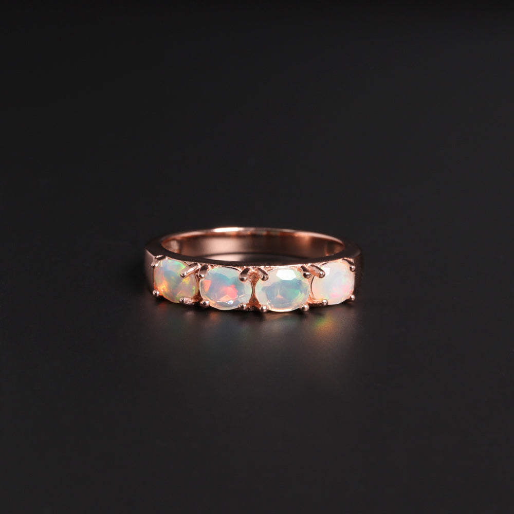 ‘Peony’ Oval Opal Half Eternity Ring – side angle
