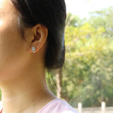 ‘Arlie’ Oval Opal Halo Clasp Earrings – on ear