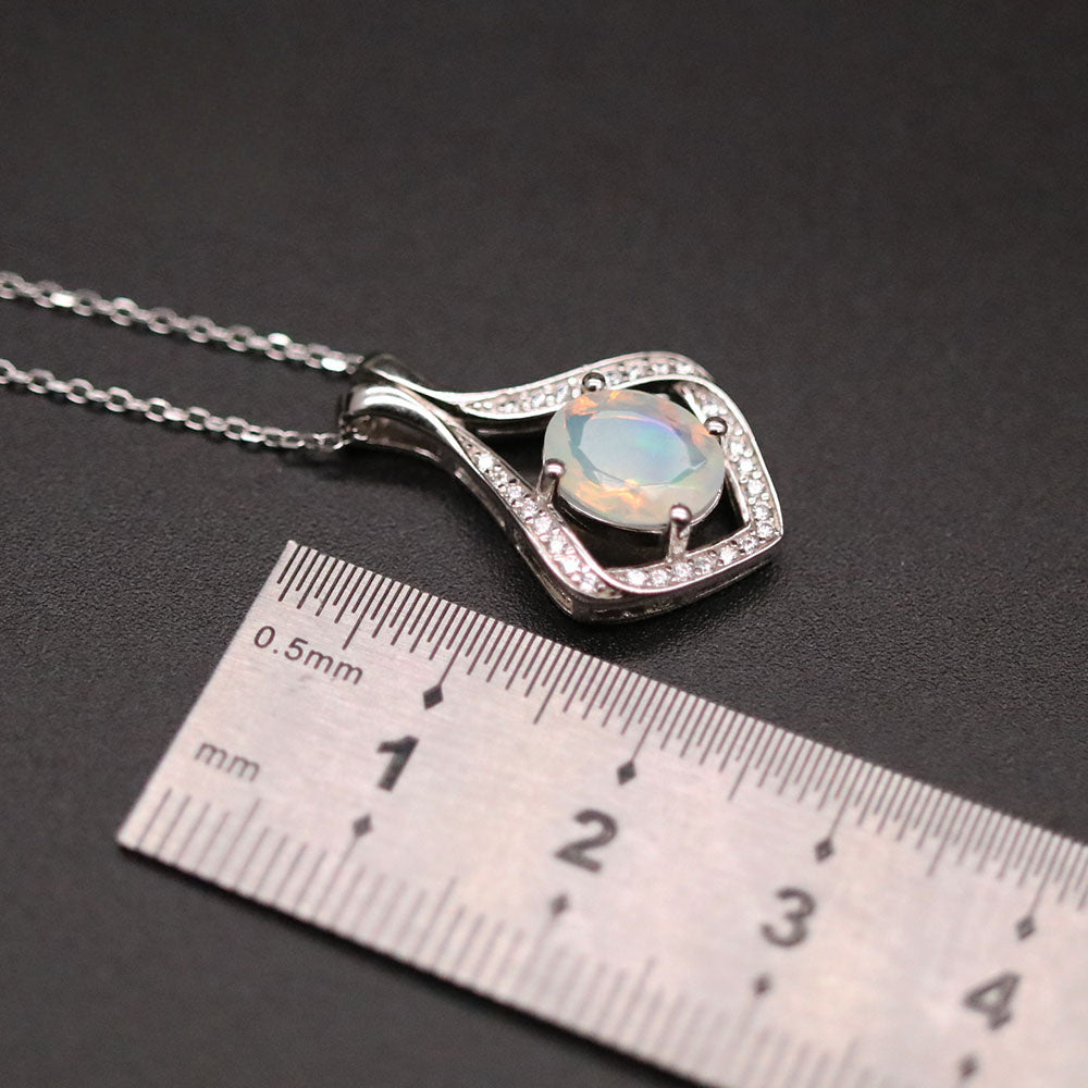 ‘Lark’ Oval Opal Kite Frame Pendant – ruler close up