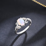 ‘Rowan’ Oval Opal Leaf Vine Ring – three quarter view