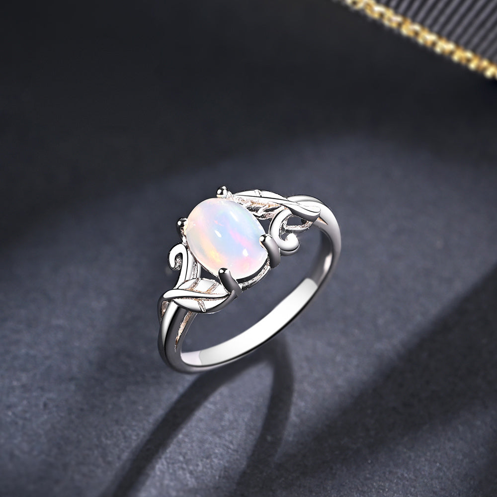 ‘Rosemary’ Oval Opal Leaf Vine Set – ring on fabric