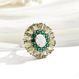 ‘Daintree’ Oval Opal Peridot Sunburst Set – ring top view