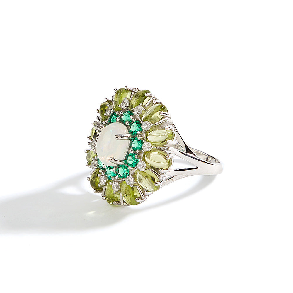 ‘Daintree’ Oval Opal Peridot Sunburst Set – ring angle view