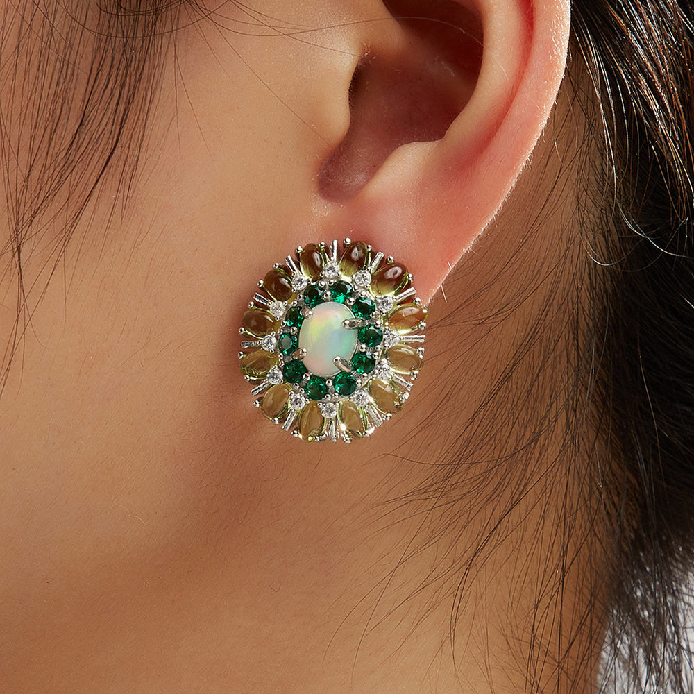 ‘Daintree’ Oval Opal Peridot Sunburst Set – earring on ear