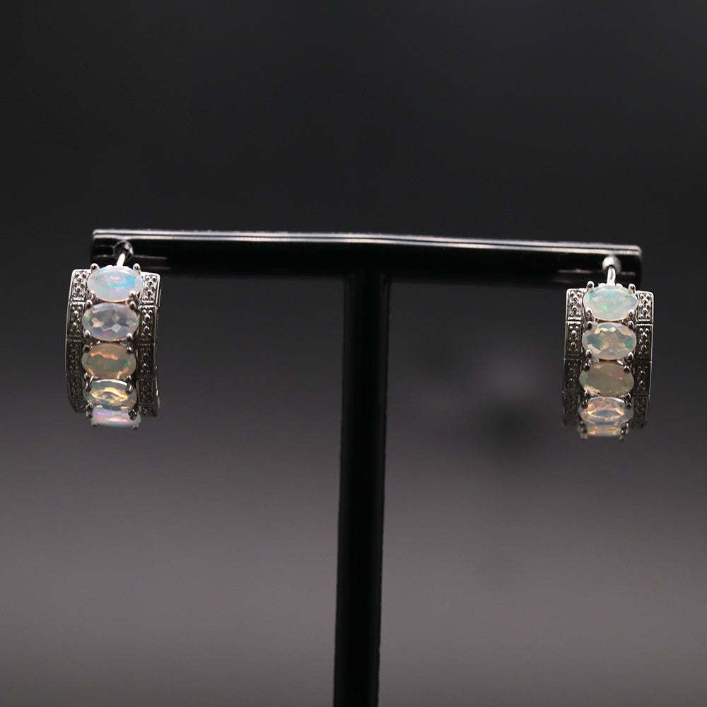 ‘Beatrice’ Oval Opal Row Hoop Earrings – on display stand