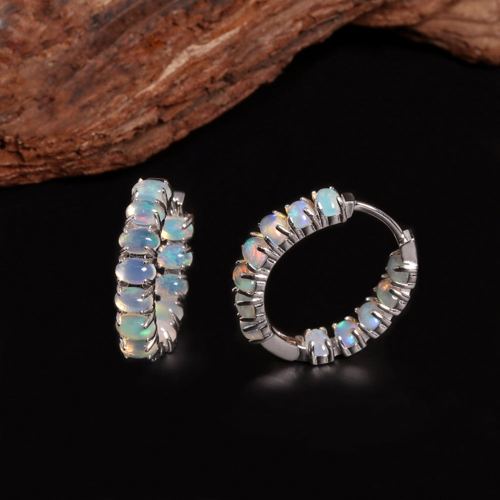 ‘Estelle’ Oval Opal Row Hoop Earrings – side and front wood