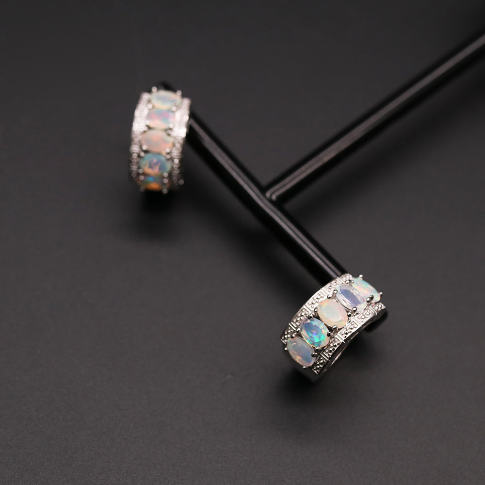 ‘Beatrice’ Oval Opal Row Hoop Earrings – on display rods
