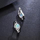 ‘Honey’ Oval Opal Spinel Swirl Earrings – on textured grey