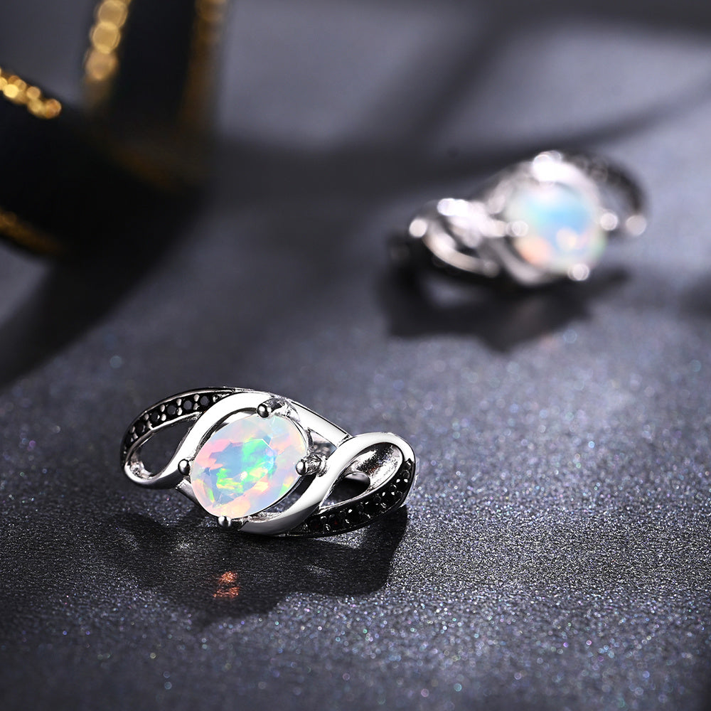 ‘Honey’ Oval Opal Spinel Swirl Earrings – pair lying