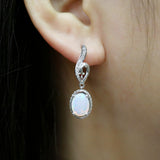 ‘River’ Oval Opal Swirl Drop Earrings – on ear