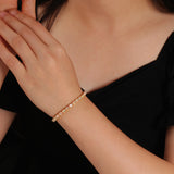 ‘Juniper’ Oval Opal Tennis Bracelet – on wrist
