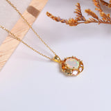 ‘Carmel’ Oval Opal Tourmaline Halo Pendant – styled flat lay
