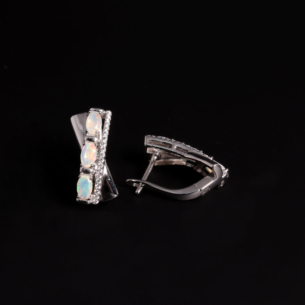 ‘Tessa’ Oval Opal X Cross Earrings – front and side