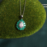 ‘Winton’ Pear Opal Agate Halo Pendant – on moss