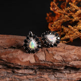 ‘Pepper’ Pear Opal Black Spinel Earrings – on wood