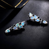 ‘Waverly’ Pear Opal Cascade Cluster Earrings – flat lay slate