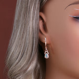 ‘Rose’ Pear Opal Chevron Drop Earrings – on ear