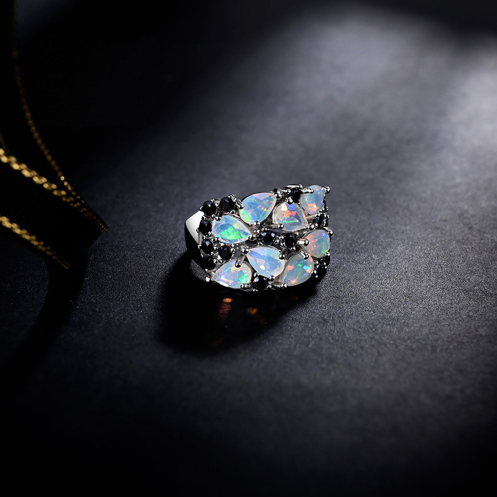 ‘Caroline’ Pear Opal Cluster Cocktail Ring – on dark fabric