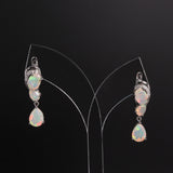 ‘Collins’ Pear Opal Cluster Drop Earrings – on display stand