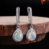 ‘Josie’ Pear Opal Halo Trio Set – earrings on wood slice