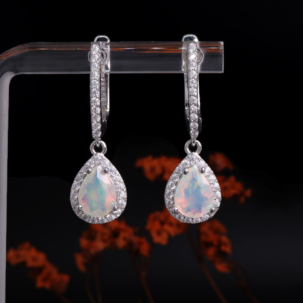‘Josie’ Pear Opal Halo Trio Set – earrings on display stand