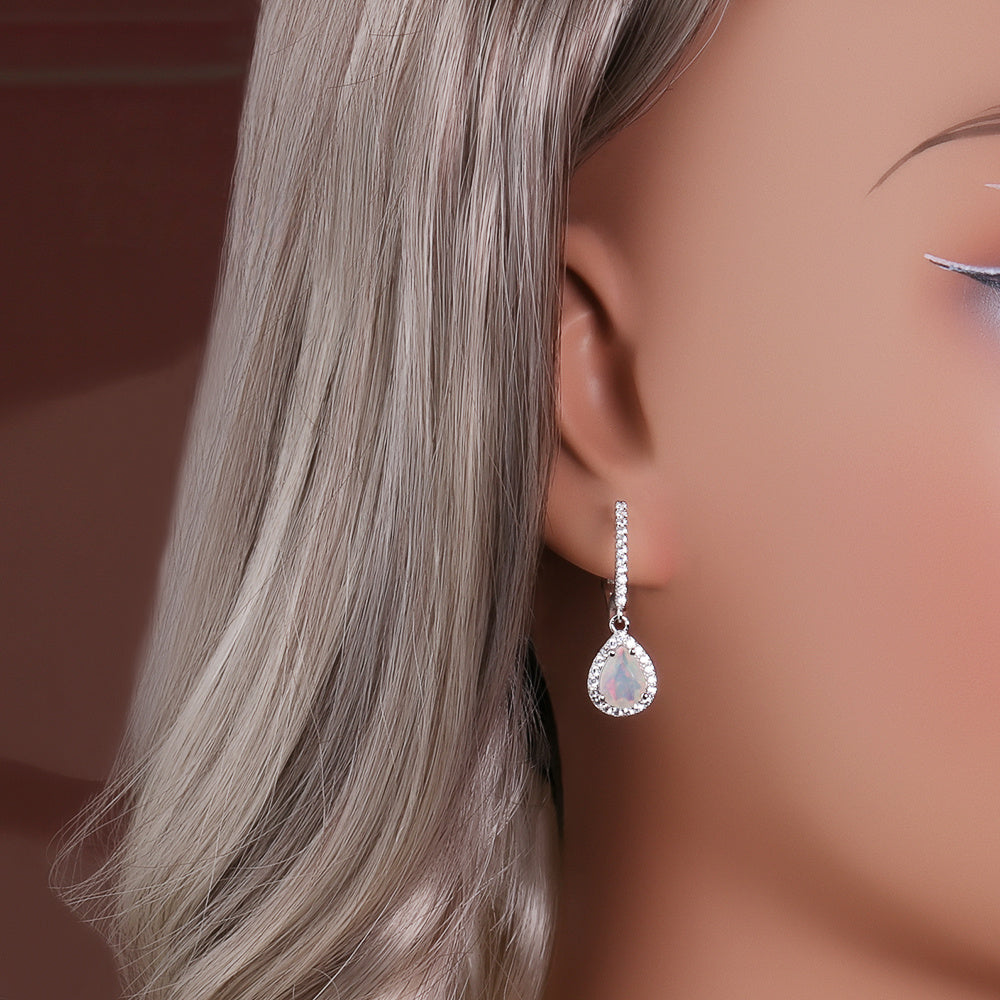 ‘Josie’ Pear Opal Halo Trio Set – earring on ear