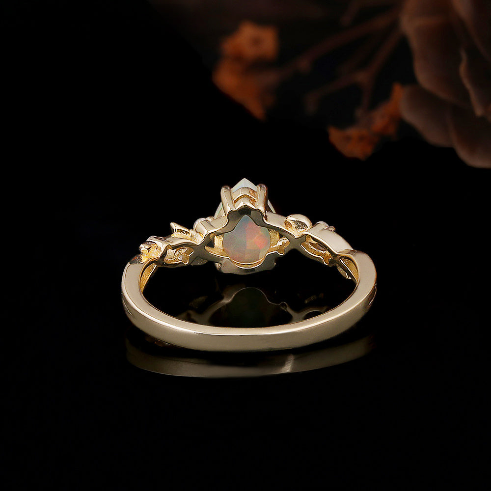 ‘Ivy’ Pear Opal Leaf Vine Ring – front standing