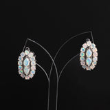 ‘Scarlet’ Pear Opal Oval Halo Earrings – on display stand