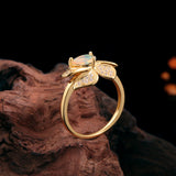 ‘Rosella’ Pear Opal Pave Flower Ring – upright on wood