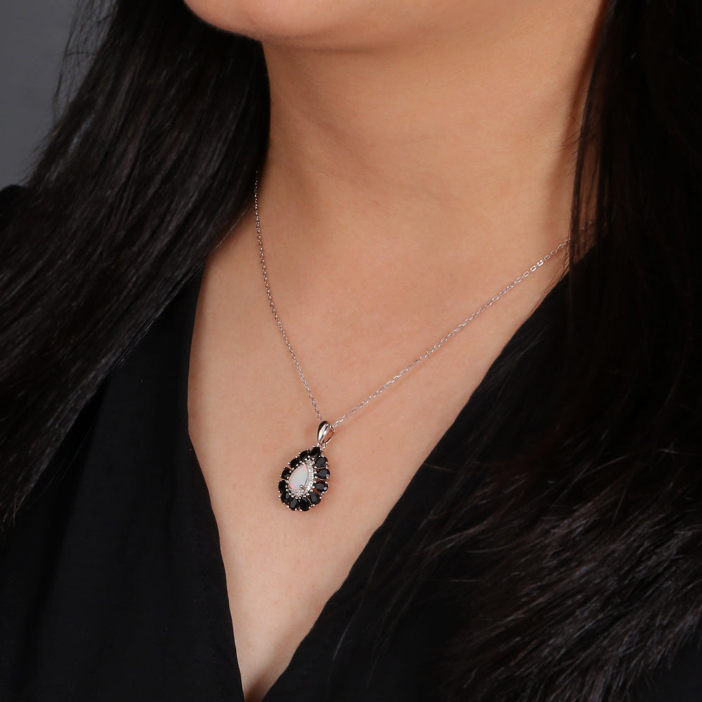 ‘Greta’ Pear Opal Spinel Halo Necklace – on neck side