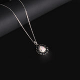 ‘Greta’ Pear Opal Spinel Halo Necklace – angled view