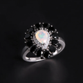 ‘Vela’ Pear Opal Spinel Halo Ring