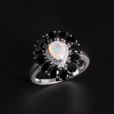 ‘Vela’ Pear Opal Spinel Halo Ring