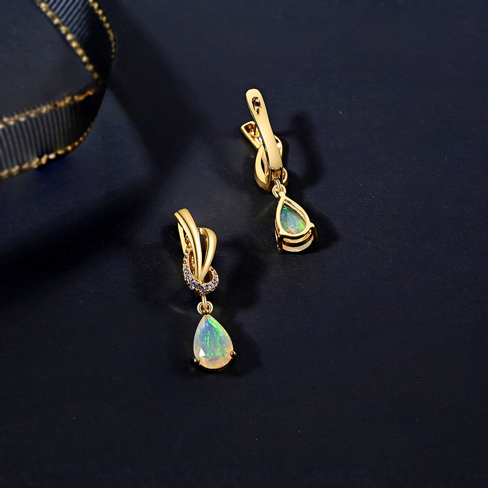 ‘Georgia’ Pear Opal Swirl Drop Earrings – on dark background